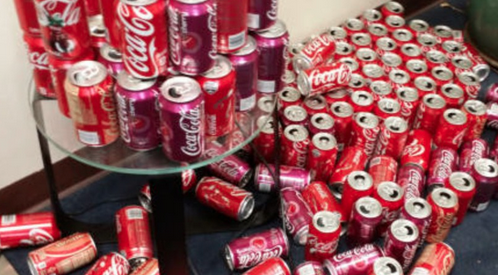 Coca Cola många